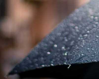 Raindrops on umbrella. Photo by Adrianna Calvo on Pexels