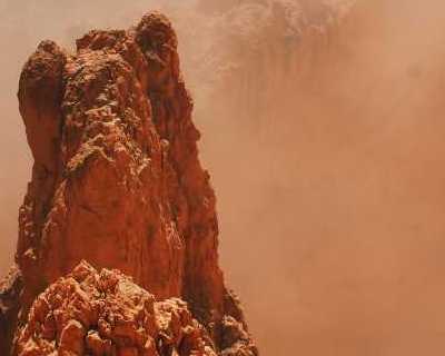 Sand storm and rock formation. Photo by Noelle Otto on Pexels
