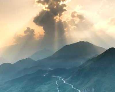 Sunset behind clouds. Photo by Quang Vigh on Pexels